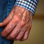 person in blue denim jeans