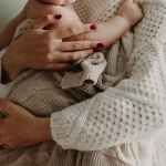 mother holding her baby