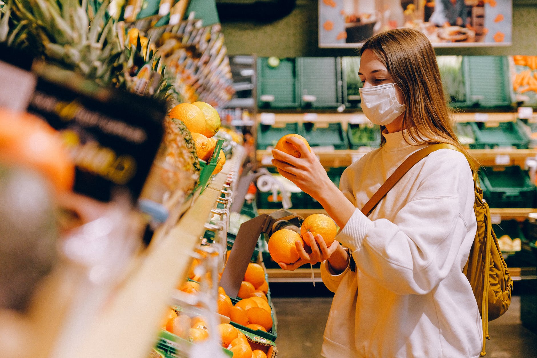 woman wearing mask in supermarket
