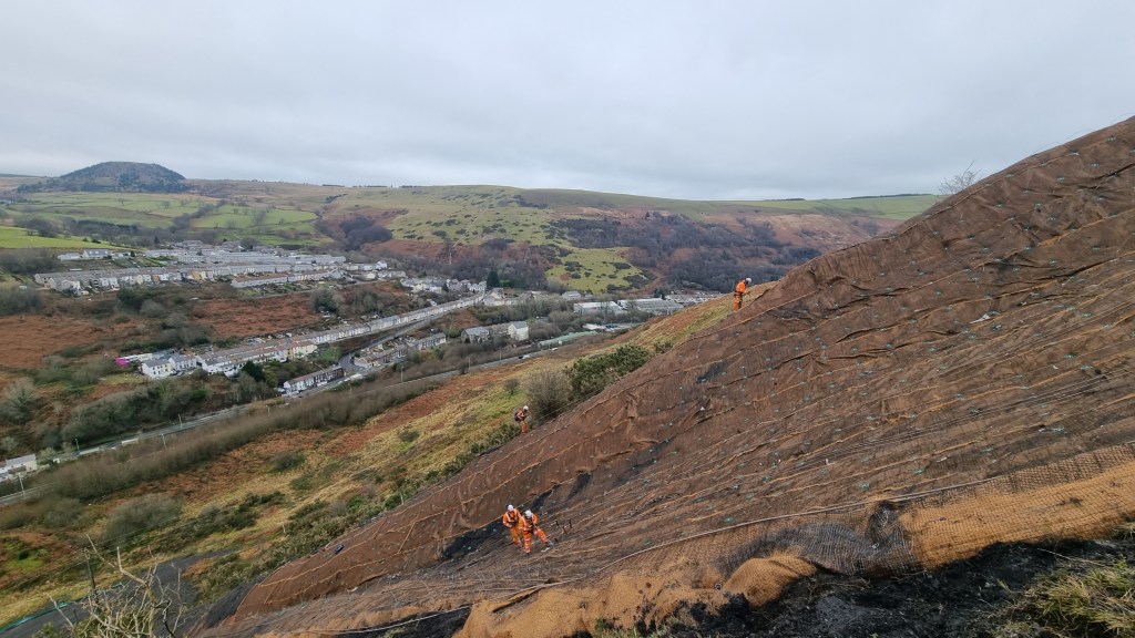 A disused coal tip in South West Wales, highlighting the ongoing safety risks from Wales’ mining legacy.