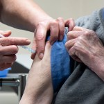 Man receiving vaccination