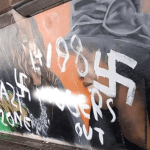 The Windrush mural in Port Talbot that was defaced with racist slogans