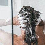 a man washing his hair