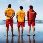 Three RNLI lifeguards monitoring the beach (Image: RNLI/Nigel Millard)