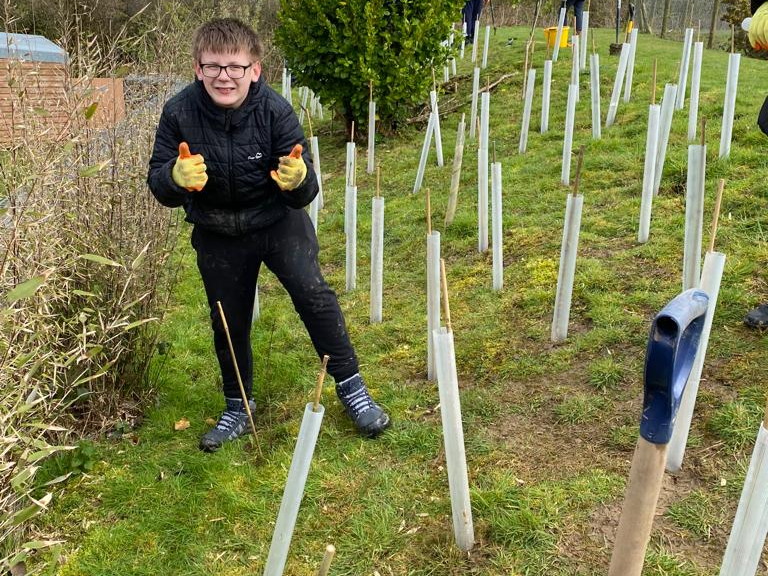 Tree planting volunteer, 12-year-old Owen