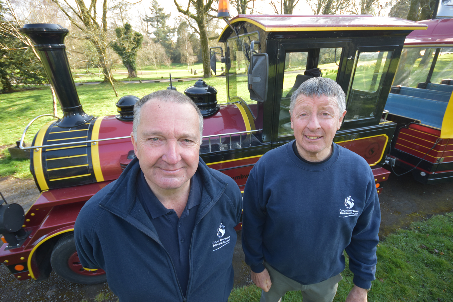 Andy Maslin and Geoff Davies, drivers and conductors with the Swansea Bay Land Rider Train. (Image: Swansea Council)