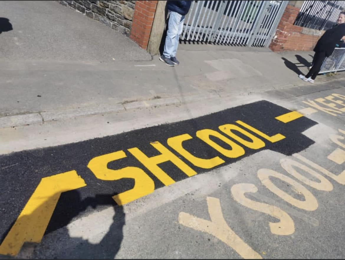 'Shcool' markings outside Llangyfelach Primary School (Image: Rob Jones / Facebook)