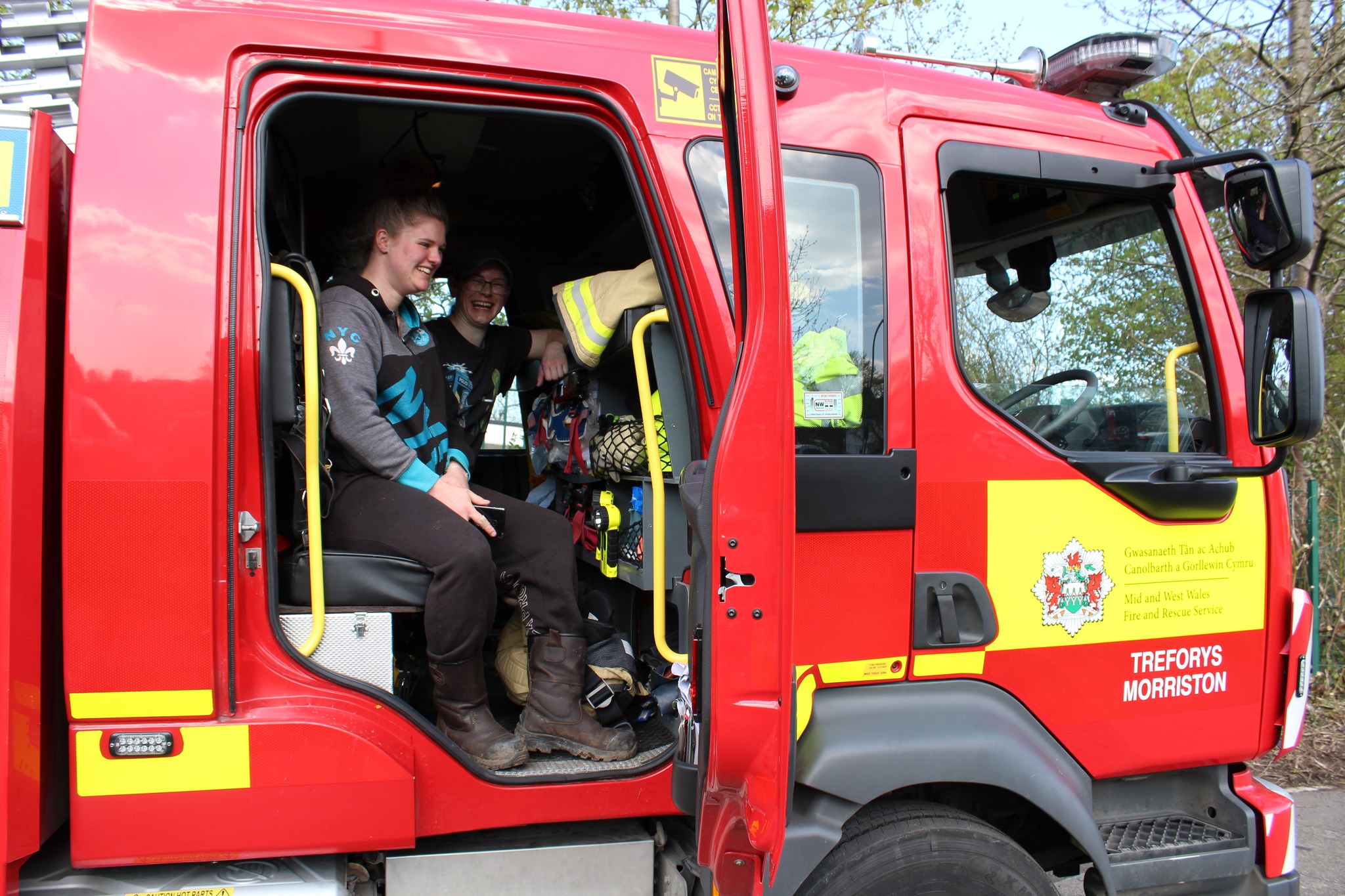 Volunteers at Swansea Community Farm check out Morriston Fire Station's appliance