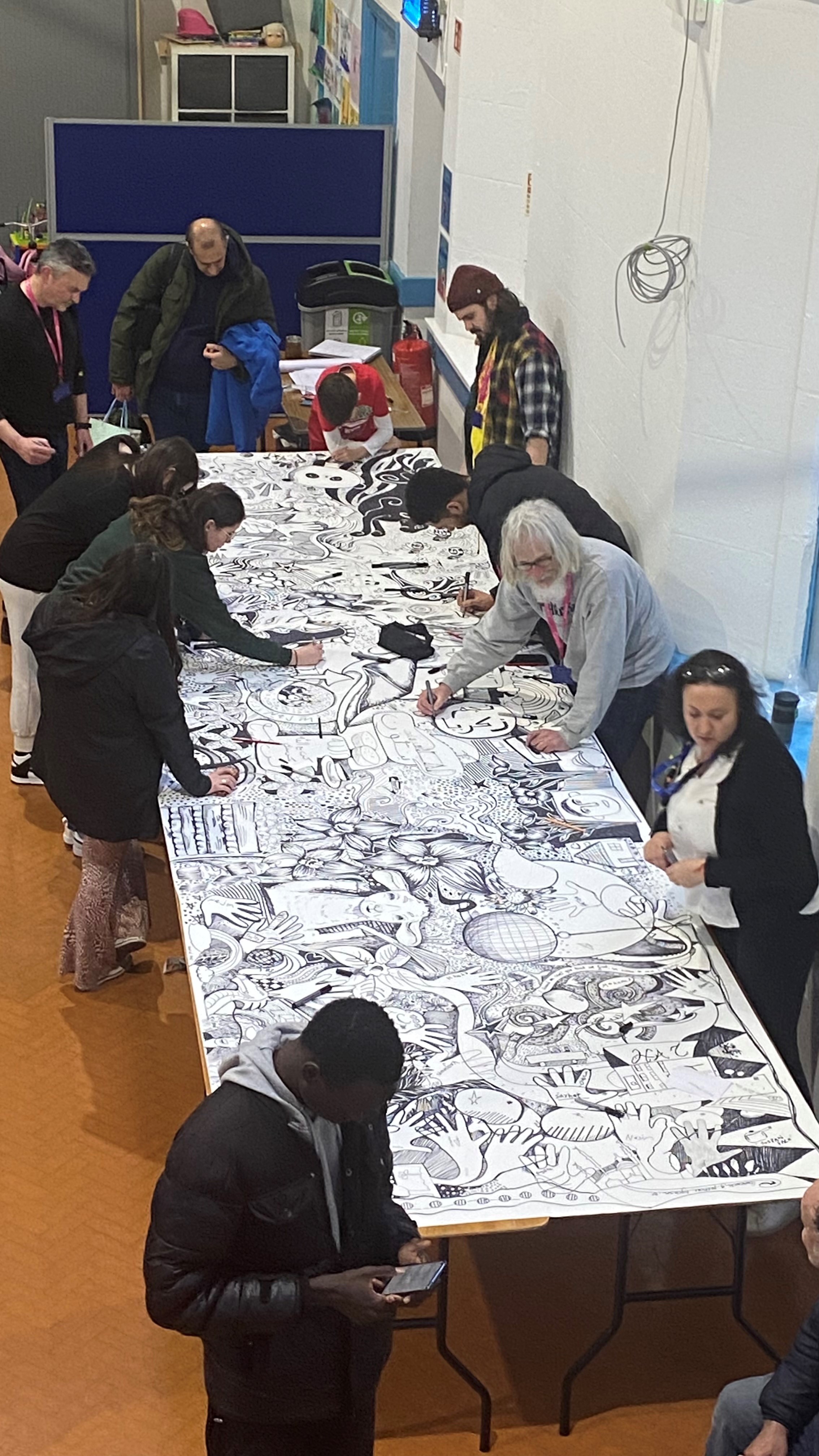 Illustration students at University of Wales Trinity Saint David’s (UWTSD) Swansea College of Art collaborated with Oasis, a centre for refugees and asylum seekers in Cardiff, to create striking artistic murals.