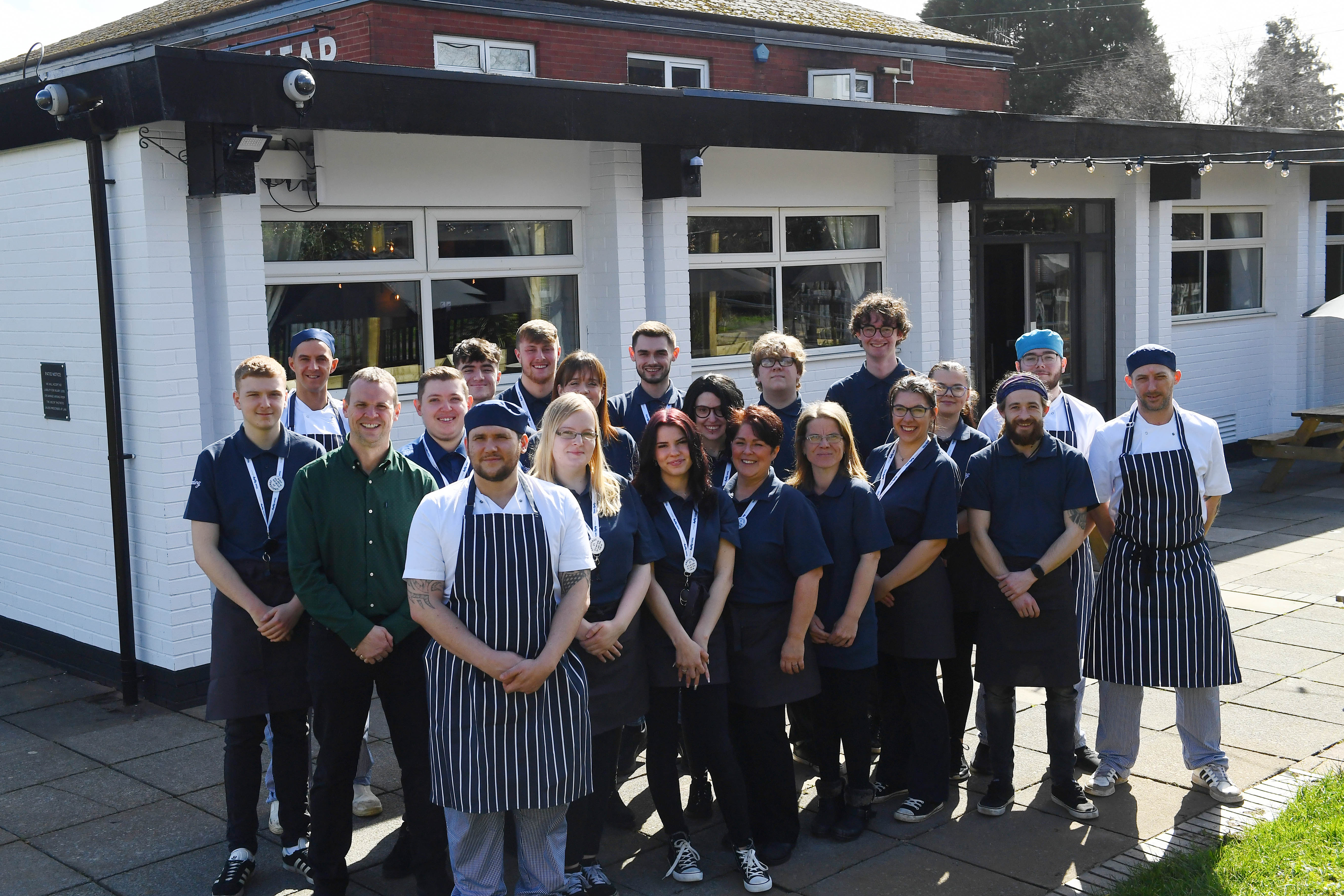 The team at Sizzing Pub's The Dear's Leap in Cwmrhydyceirw after the bar had an extensive makeover