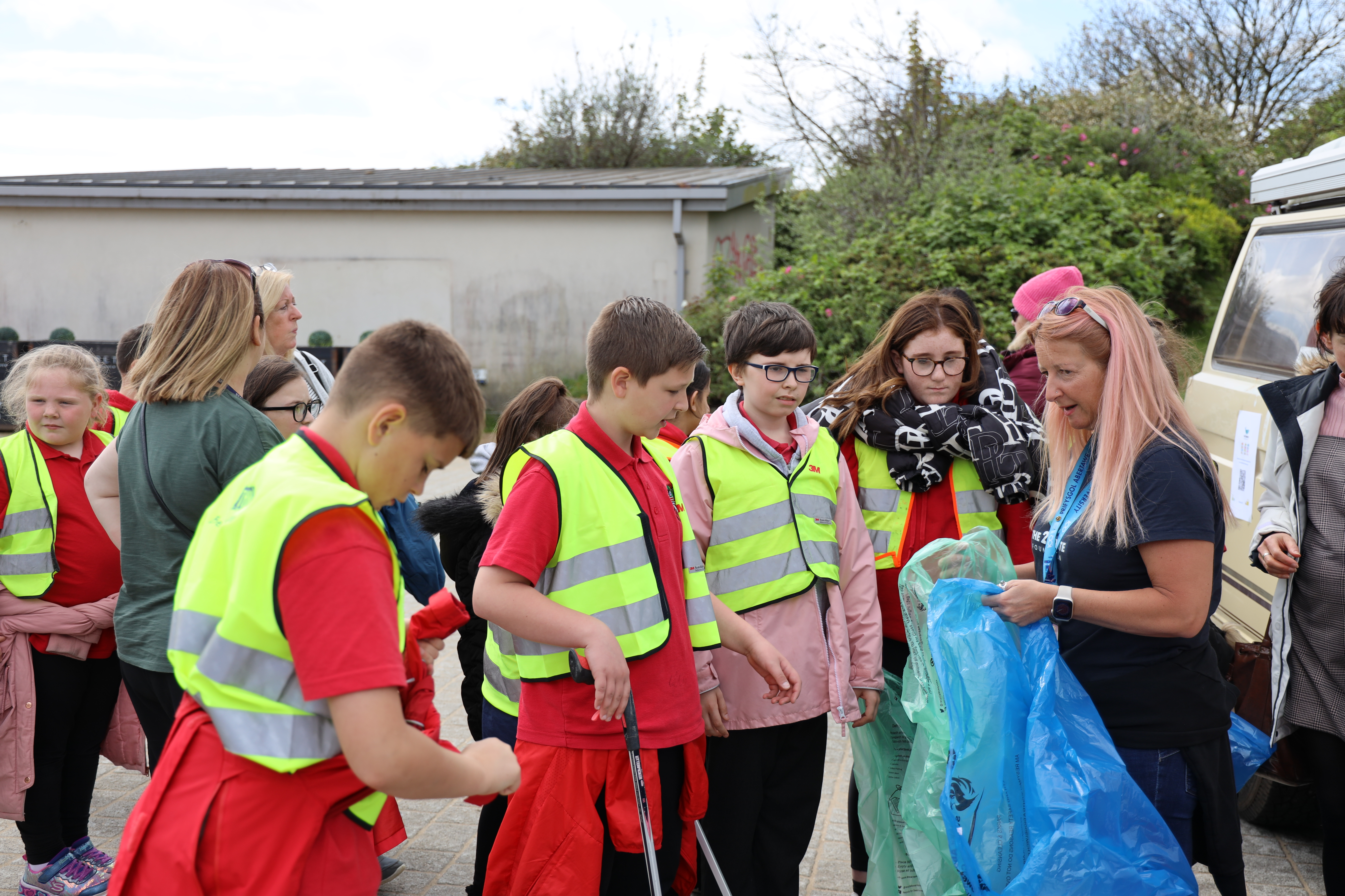 volunteers get ready to head to Swansea Beach.