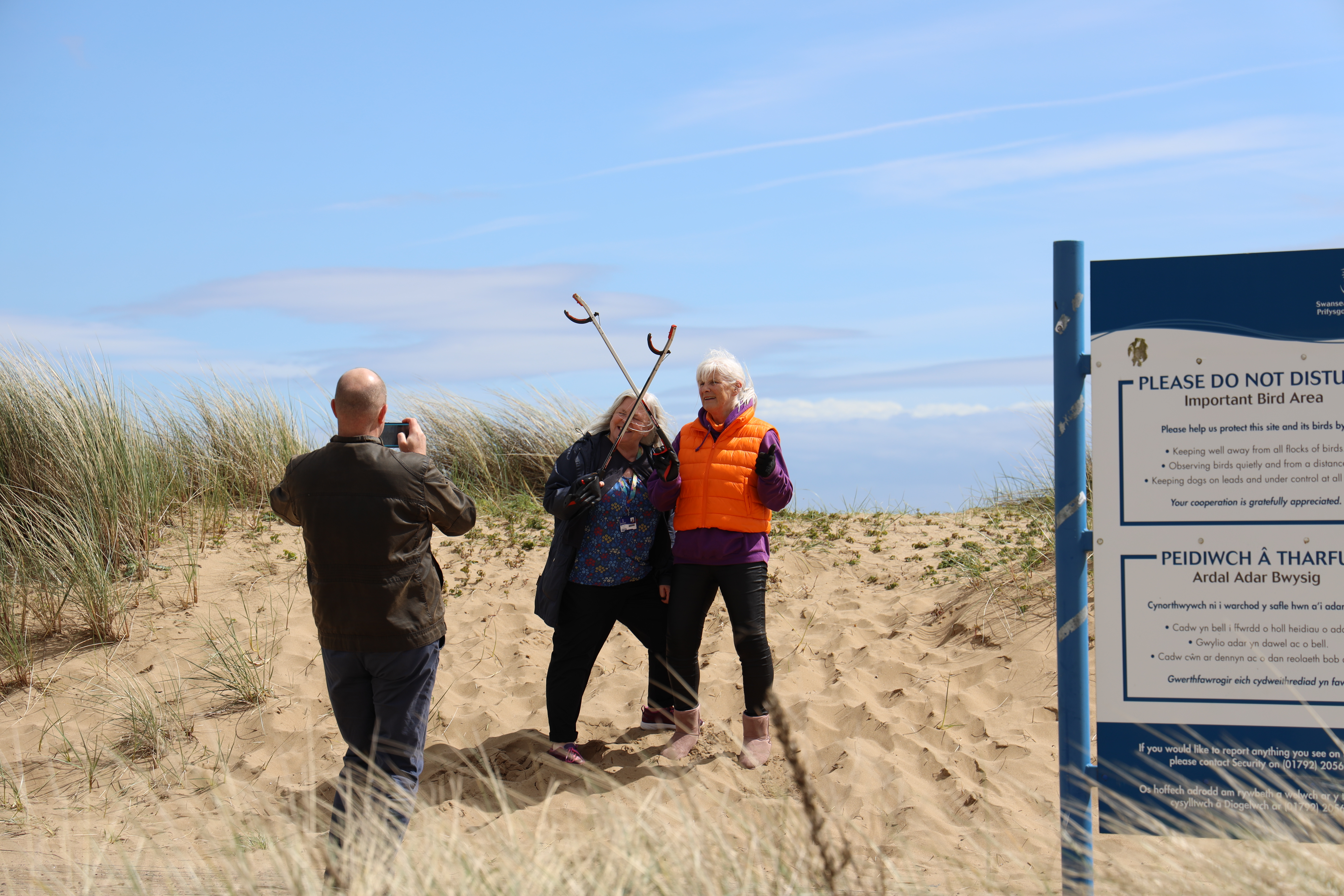 staff during the litter pick at Swansea University’s Bay campus beach