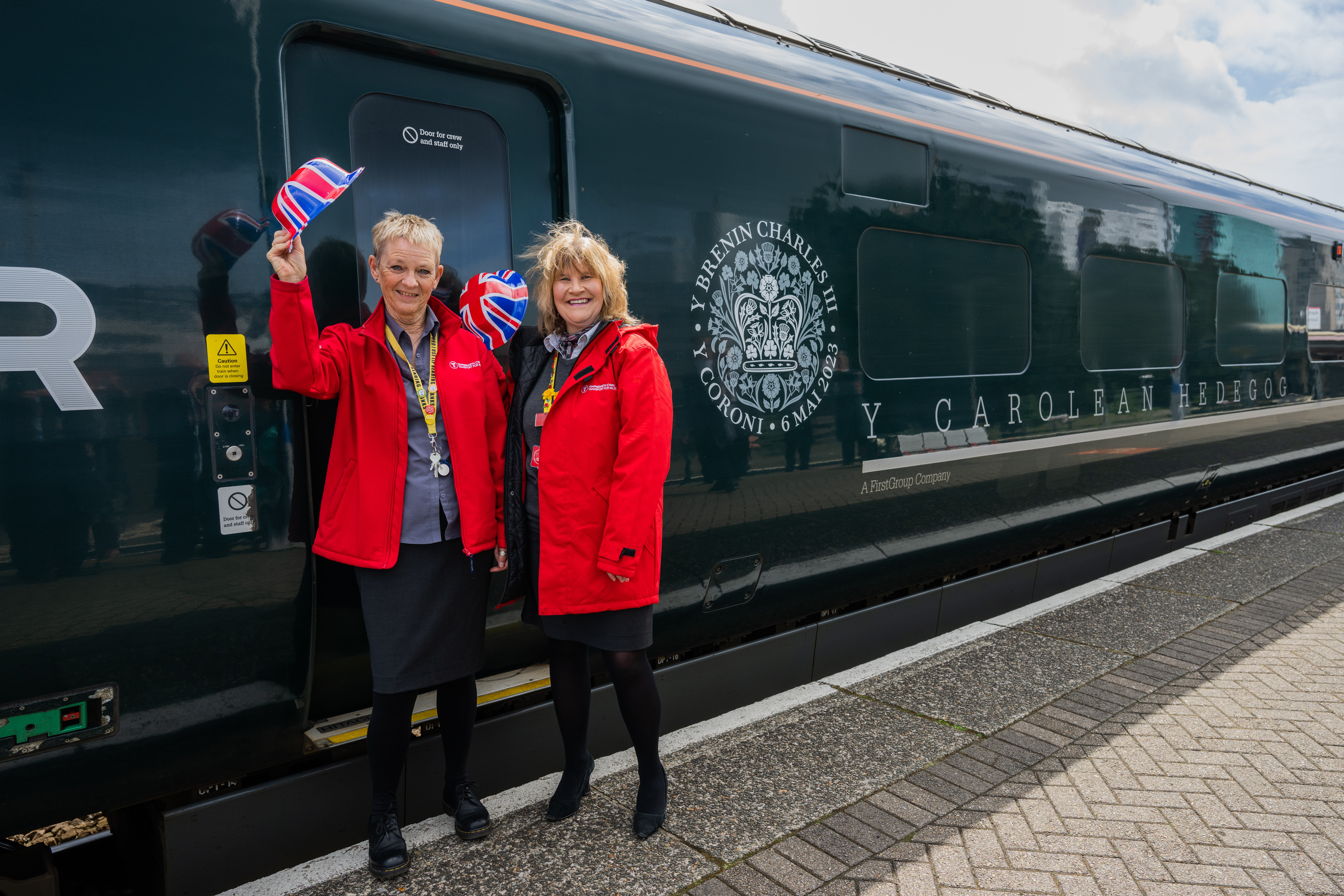 Swansea Train Station staff with the newly branded GWR coronation train.