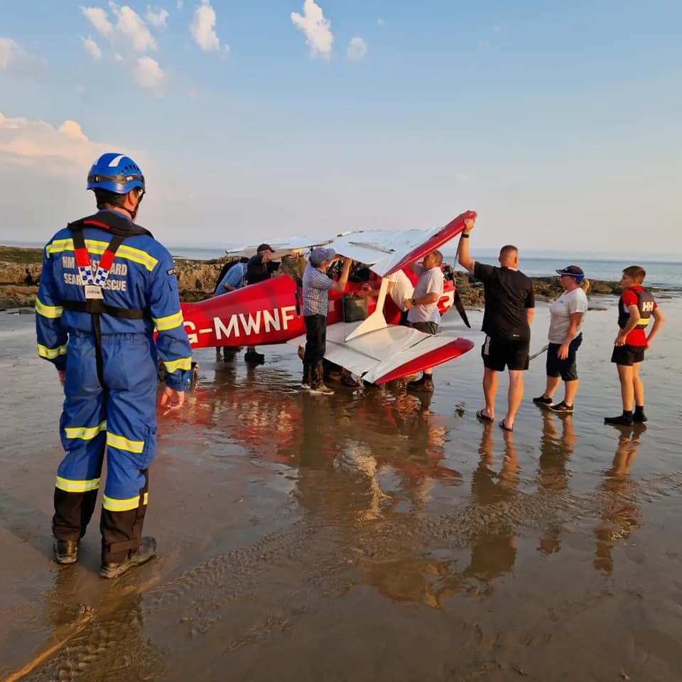 A light aircraft recovered on the beach after it crashed off the coast of Porthcawl