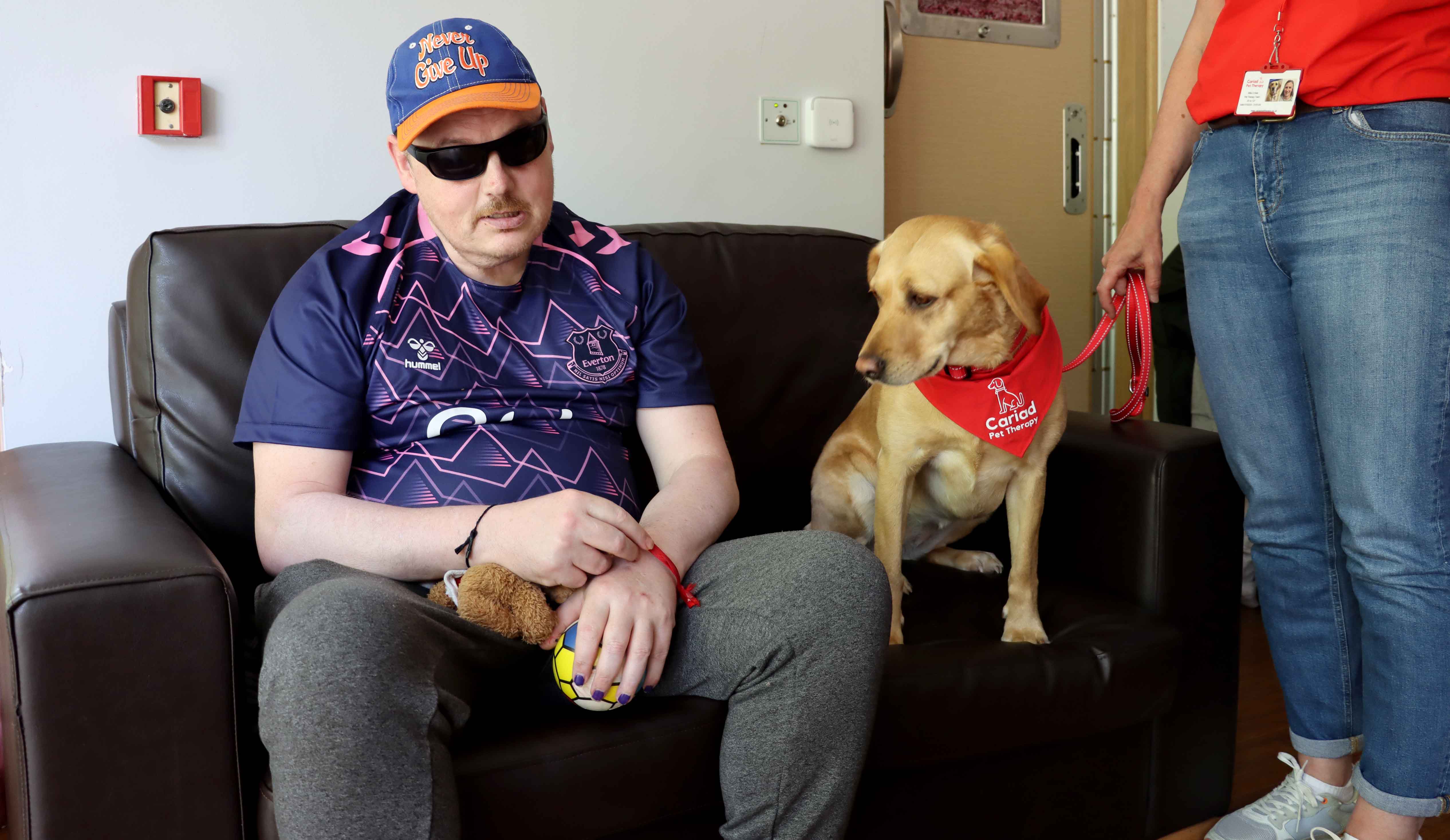 Jason with therapy dog Billie