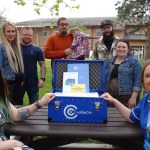 Pictured with the Cuddle Cot are: Chantele Cross-Jones and Christie-Ann Lang, along with support group members Lauren Greenhill, Leon Buckley, Jazzmin Roberts, Adam Japp, Jonathan Cross-Jones with two-year-old Effie, and Interim Midwifery Matron Felicity Curtis.