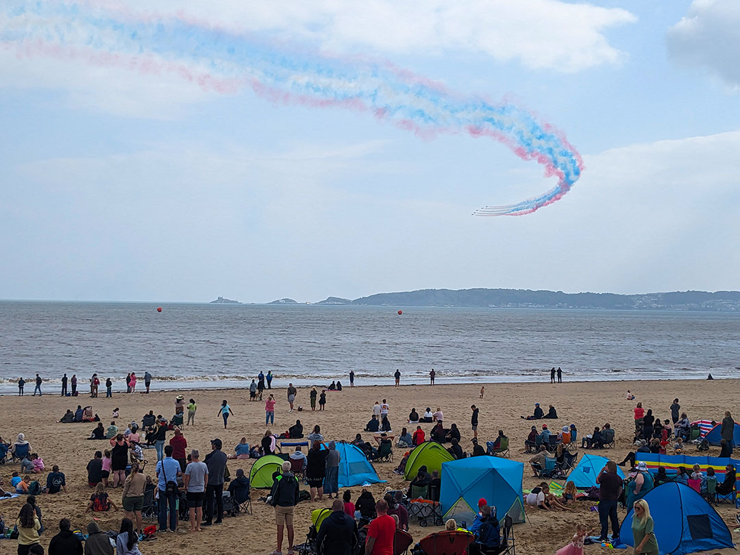 Crowds on Swansea beach watching the Red Arrows over Swansea Bay