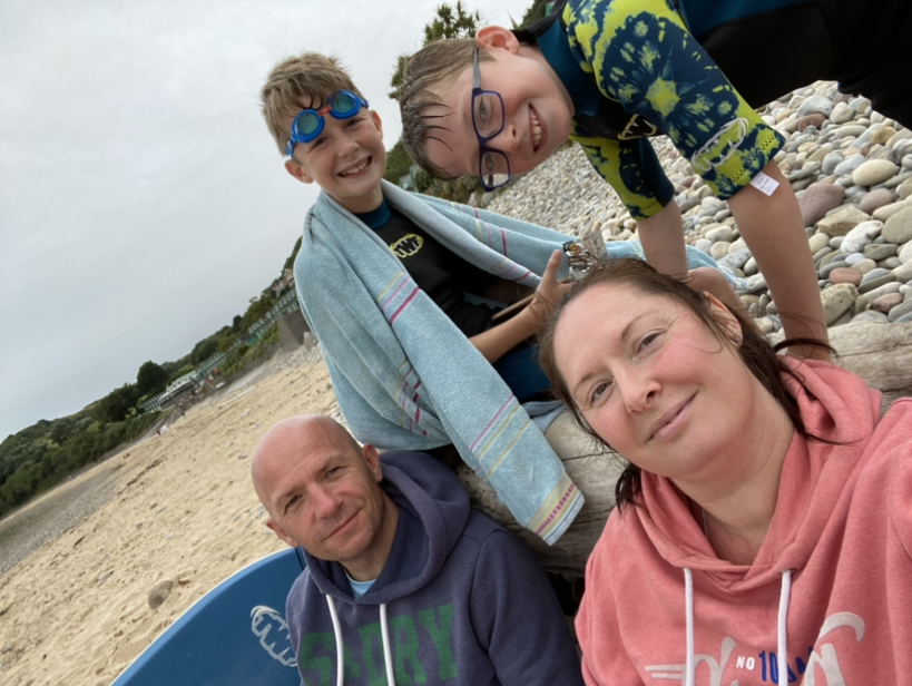 Carter with his dad, Adrian, his mum, Louisa, and his older brother, Cole