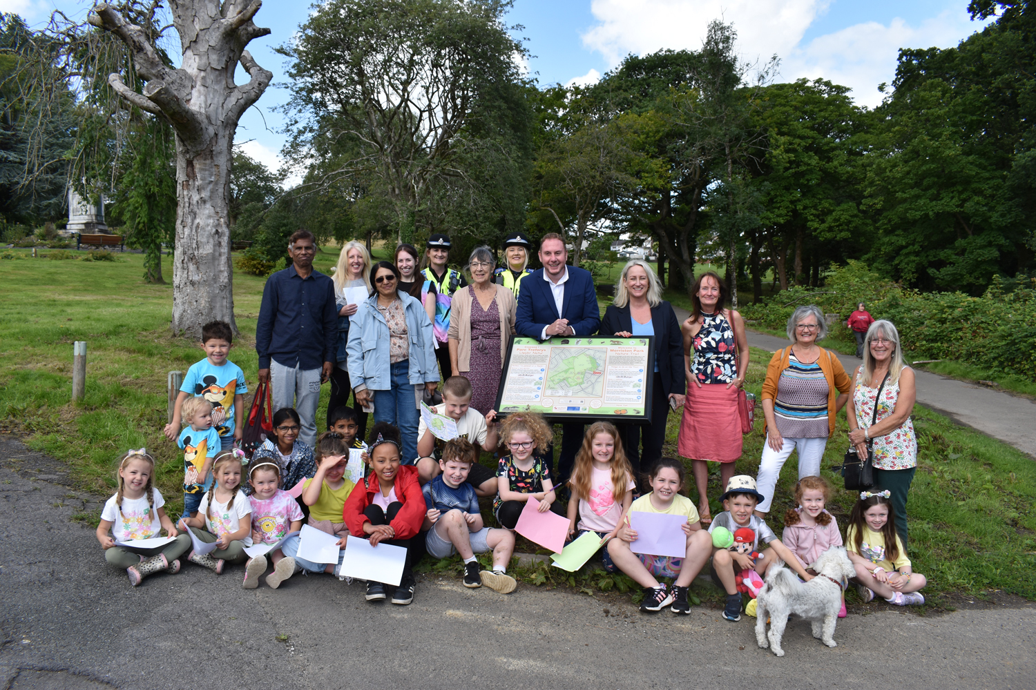 Members and supporters of Friends of Morriston Park celebrate the official launch of the park’s nature trail.