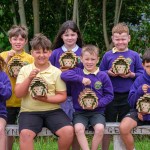 Trimsaran Primary pupils with their 'Bee Hotels'