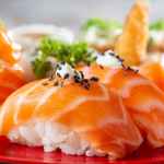 close up of sushi with salmon