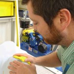 Rhys Jenkins demonstrates how the bolus fits against the radiotherapy mask.