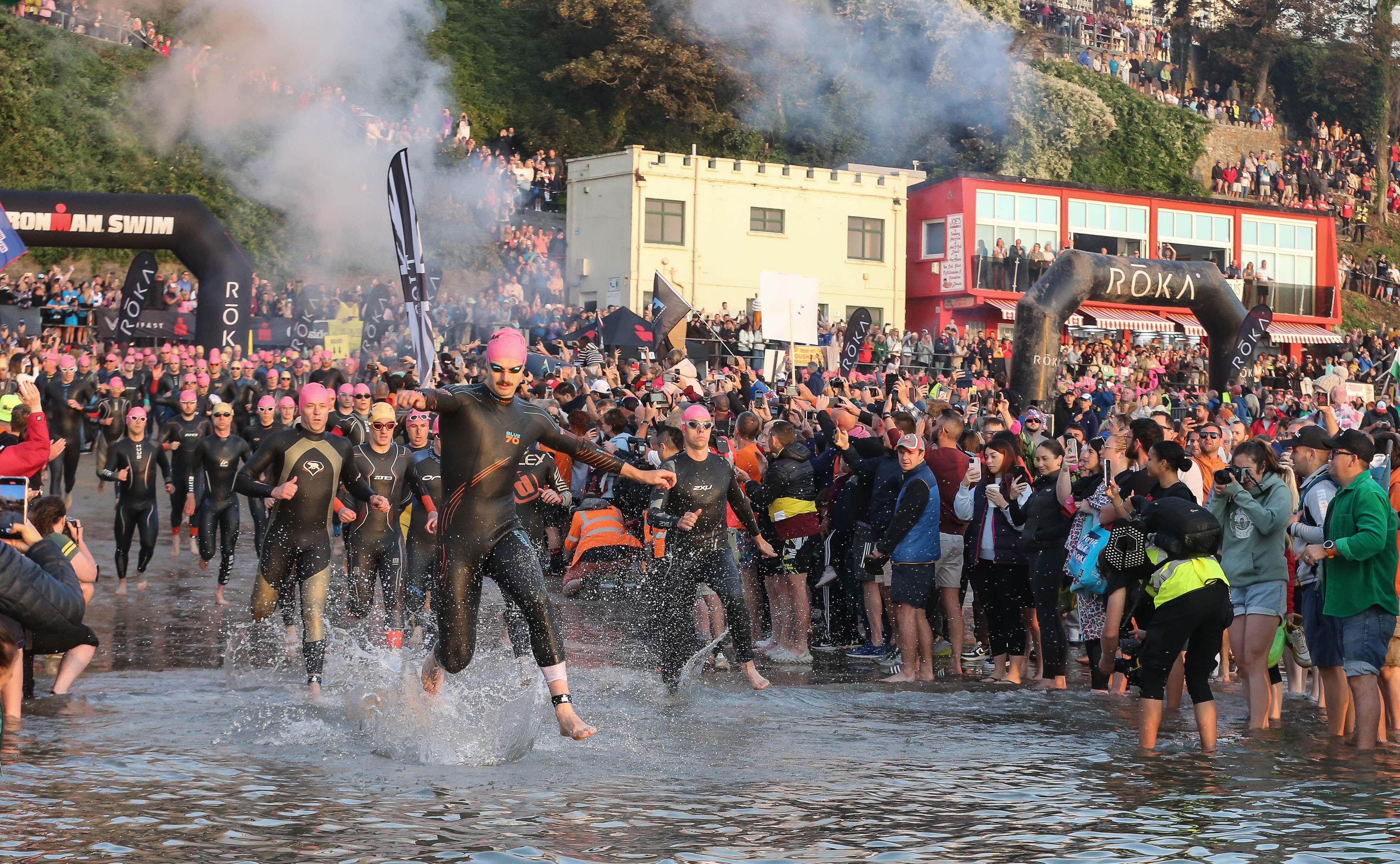 Tri clubs gathered on the beach ahead of IRONMAN Wales (Image: Huw Fairclough for IRONMAN UK)