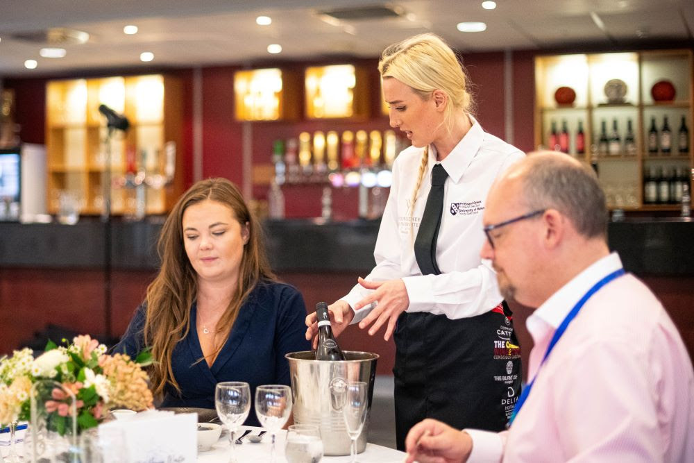 Judges mark wait staff as part of the Wales regional round of World Young Chef Young Waiter (YCYW) competition