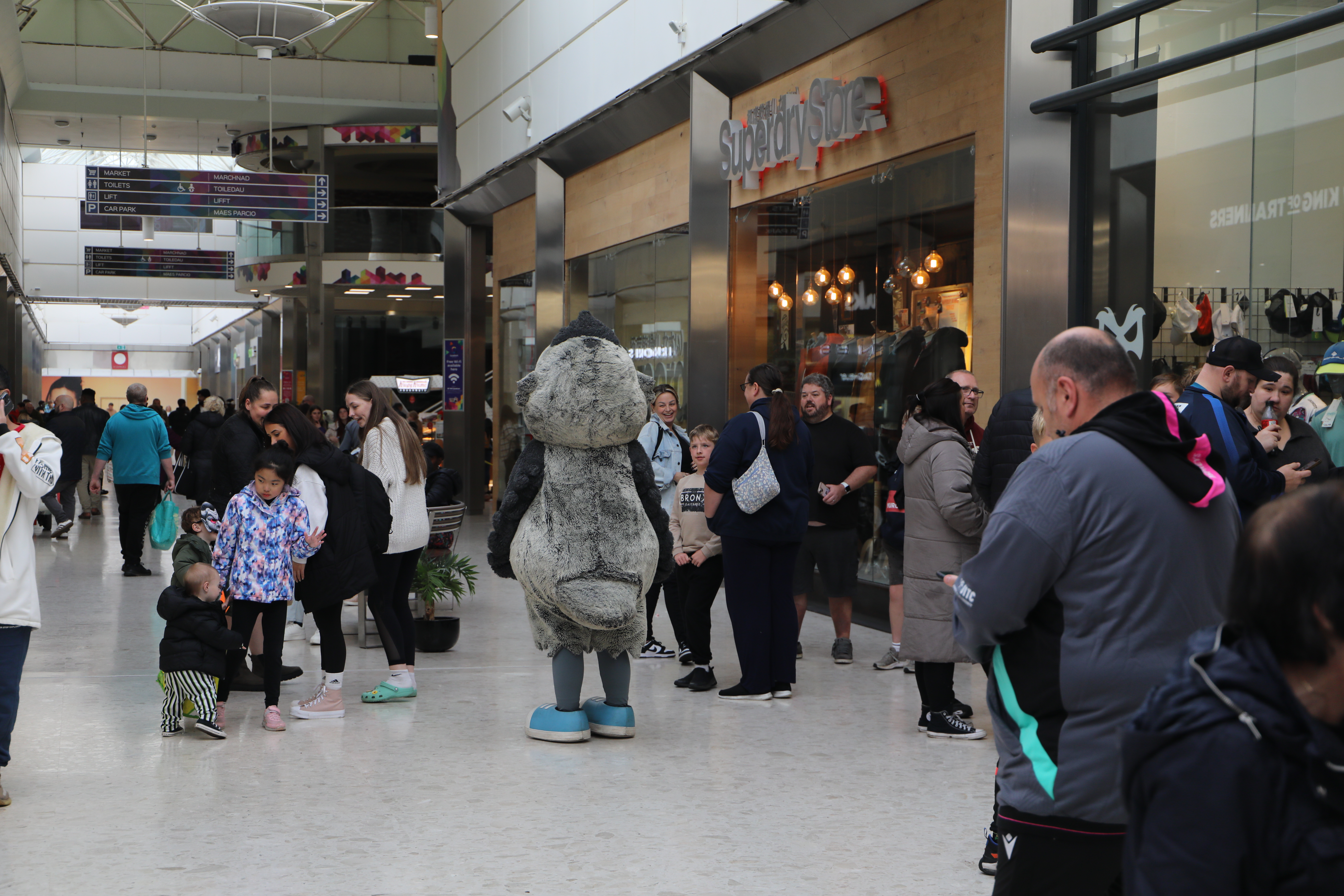 Crowds gathered for the official opening of the Osprey's new club shop in Swansea's Quadrant Shopping Centre