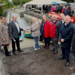 Cutting the ribbon on the canoe portage ramp.