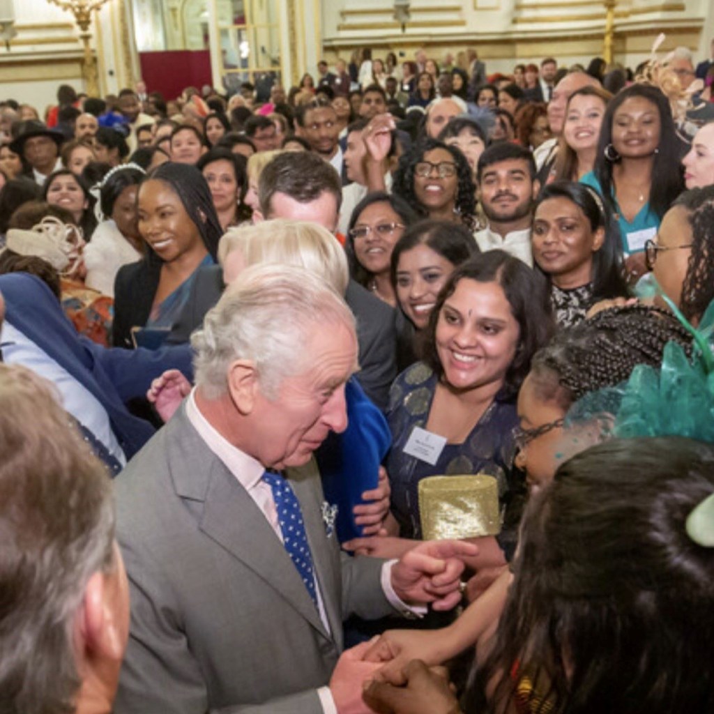 Cerina Howells enjoys a conversation with King Charles.
