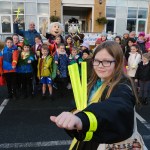Saundersfoot CP School pupils on the Stride to School wearing their slapbands, sponsored by South Hook LNG. Also pictured are local county councillor Chris Williams, Ziggy the Zebra, and Charlie Shivers.