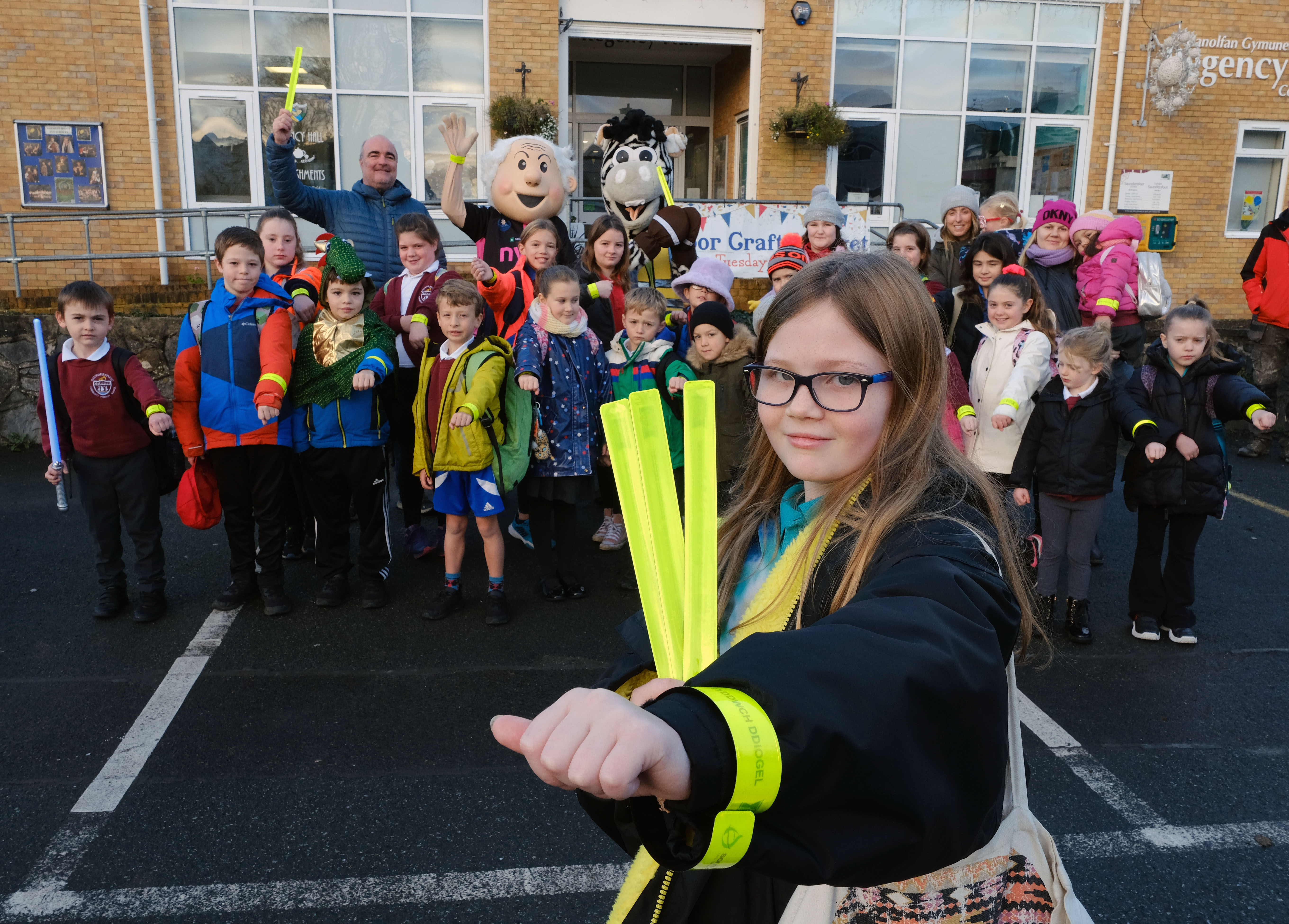 Saundersfoot CP School pupils on the Stride to School wearing their slapbands, sponsored by South Hook LNG. Also pictured are local county councillor Chris Williams, Ziggy the Zebra, and Charlie Shivers.