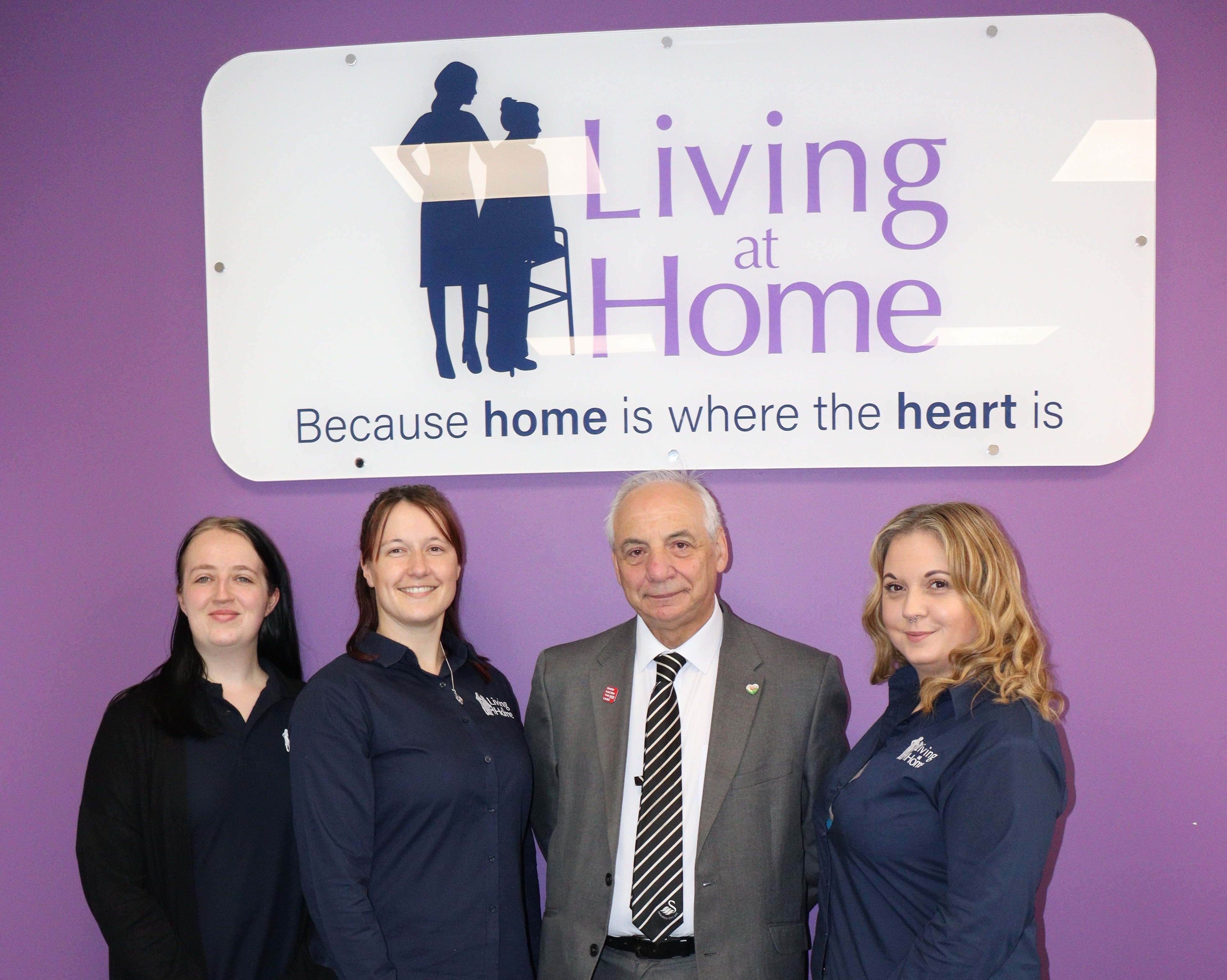 Mike Hedges MS with staff from care providers 'Living at Home'