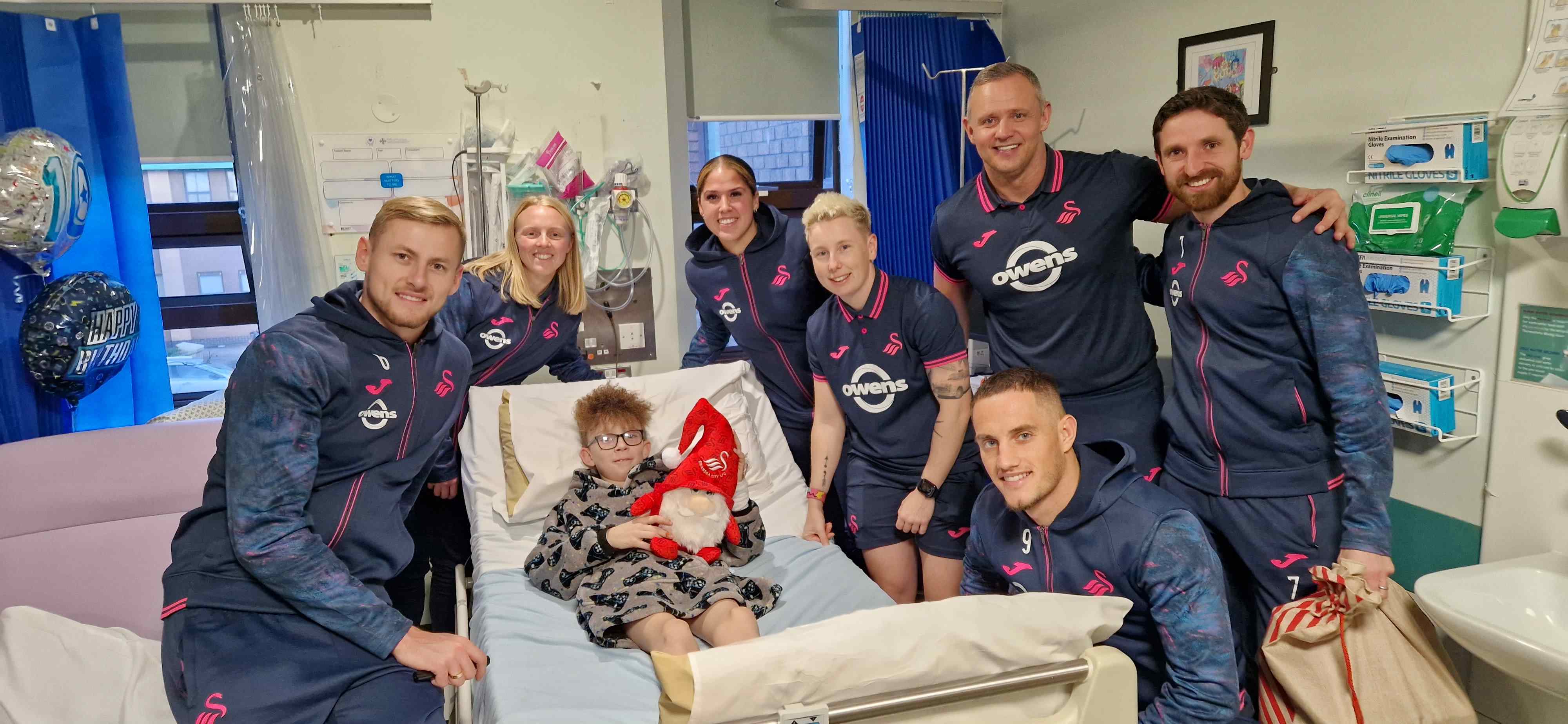Blake Leyshon, 10, spent time chatting to the Swans players during their visit.