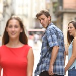 Disloyal man walking with his girlfriend and looking amazed at another seductive girl (Image: Shutterstock / Antonio Guillem)