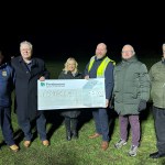 Pembrey AFC recieve a cheque for £2,000 from developer Persimmon Homes