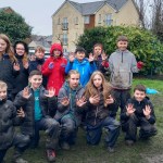 Schoolchildren from Pontarddulais Primary school help create a wildlife garden at their local fire station.
