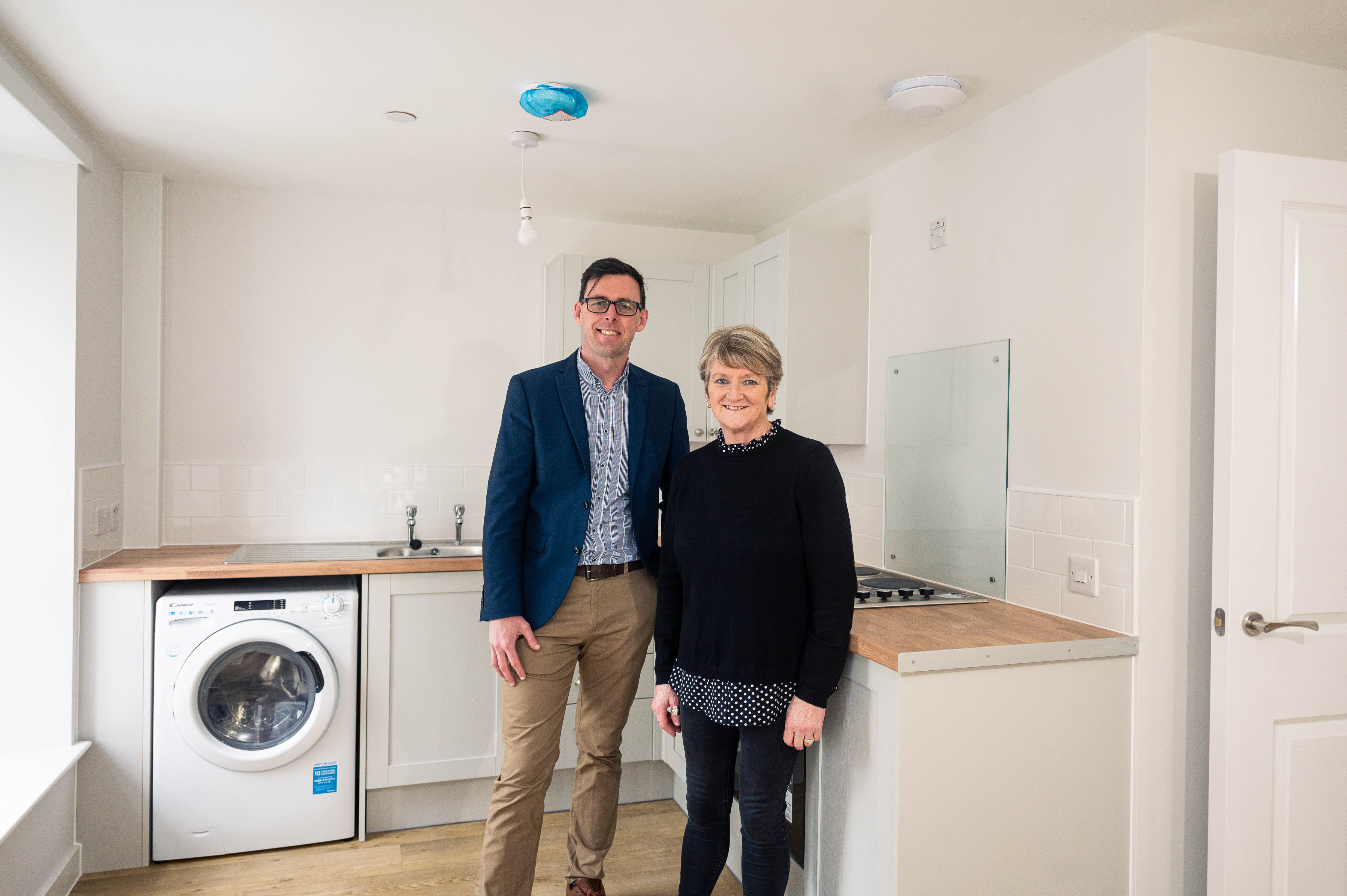 Cllr. Darren Price, Leader of Carmarthenshire County Council and Cllr. Linda Evans Davies, Cabinet Member for Homes at the new Spilman Street housing. (Image: Carmarthenshire Council)