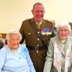 Mrs Kath Morris (right blue jumper) pictured at St Theodore’s Parish Hall with Captain Williams and Mrs Gwenfron Picken.