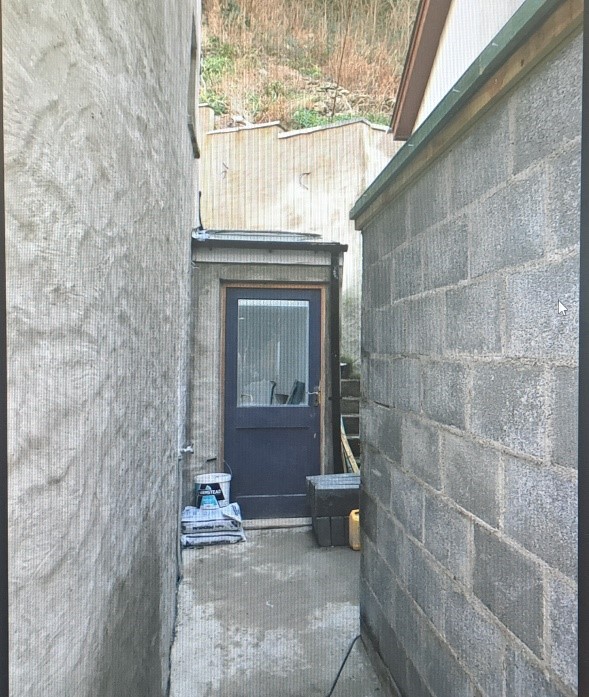 The illegal lean-to structure before demolition