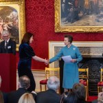 Gill Adams receiving the Butler Award.