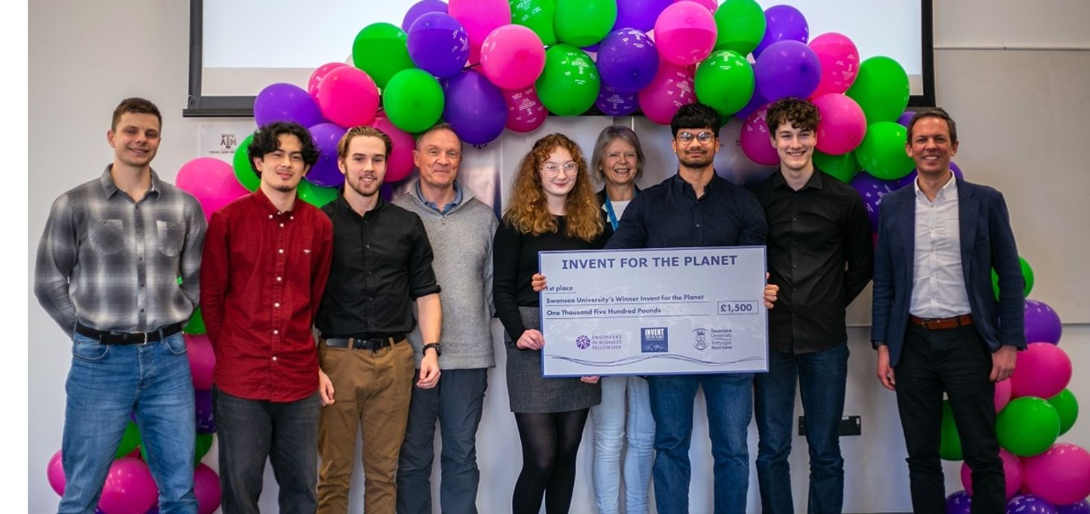 Winning team Pure Flow with competition judges, at the Swansea University event. They went on to reach the European semi-final of Invent for the Planet
