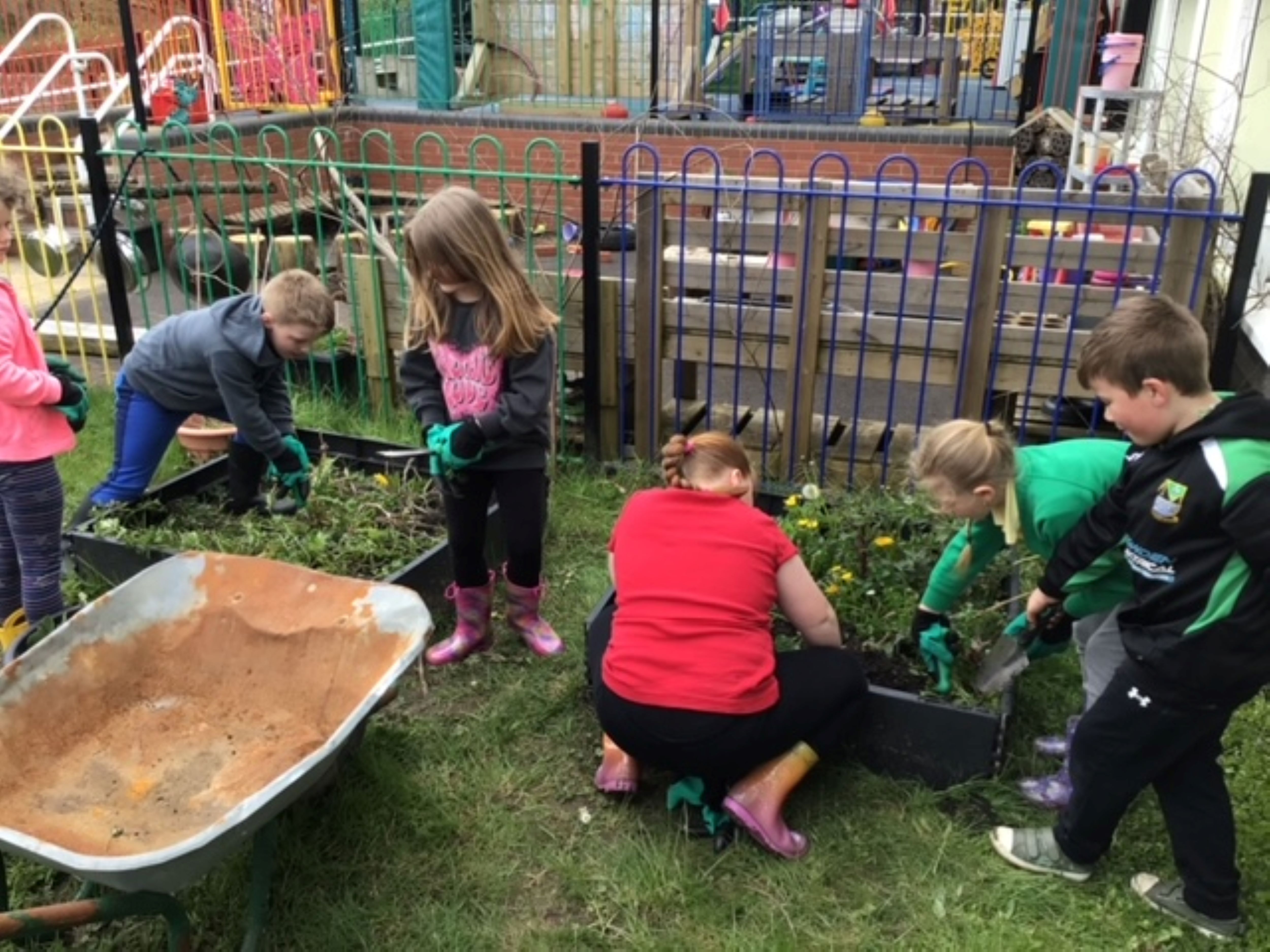 Children from Carway Primary school with their new gardening kits
