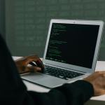 person using macbook air