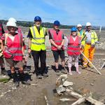Members of The Story of Mumbles website are shown the remains of a boat from the community's former oyster fleet.