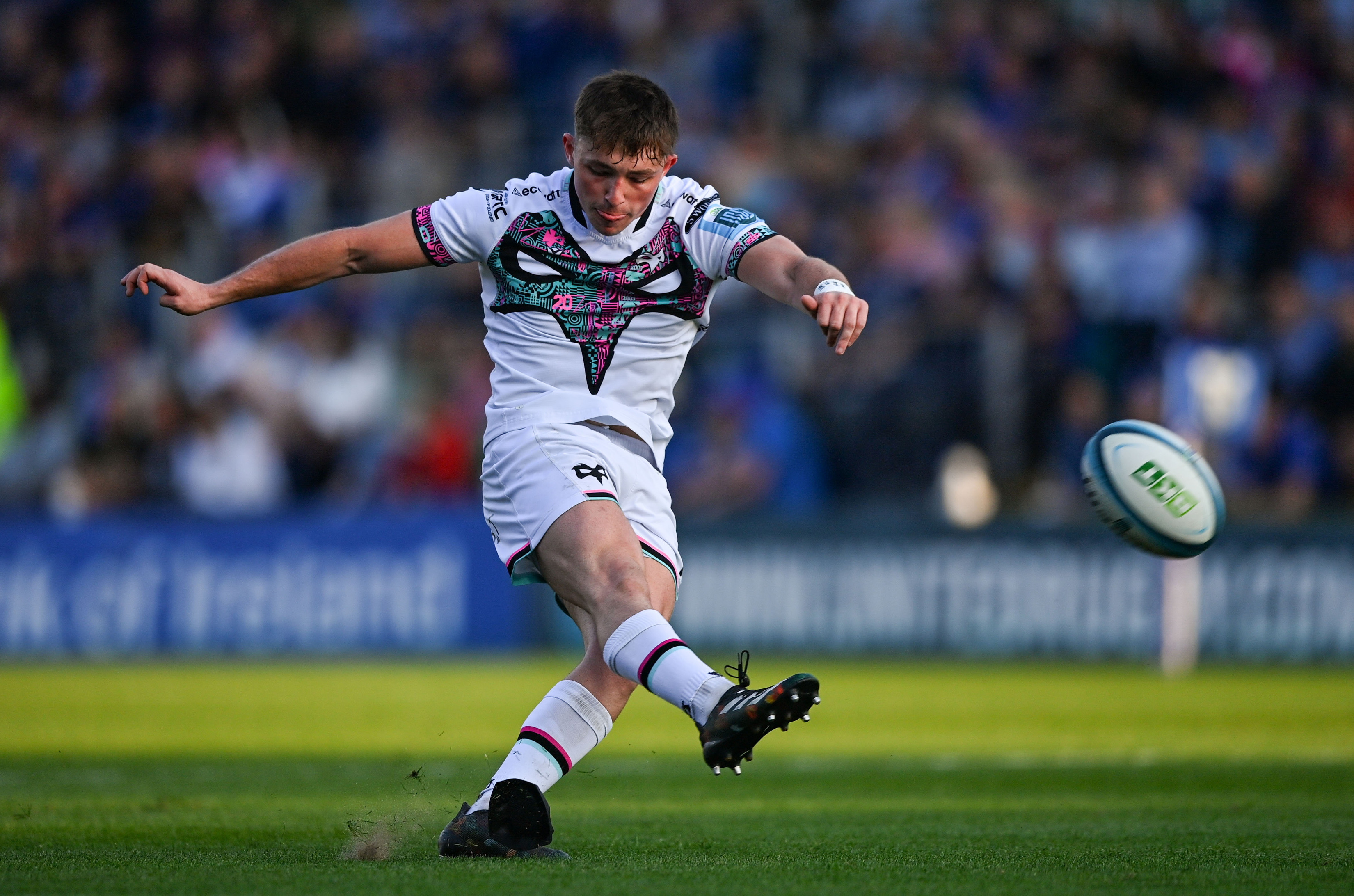 Dan Edwards kicking a conversion for the Ospreys in a United Rugby Championship match against Leinster.