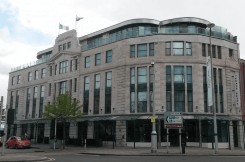 Current exterior view of the Grand Hotel Swansea, a landmark building beside the railway station.
