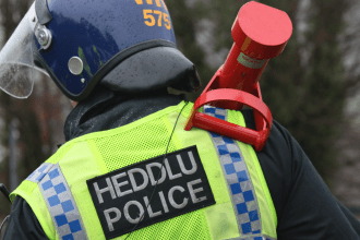 Dyfed Powys Police Officer raiding cannabis farm
