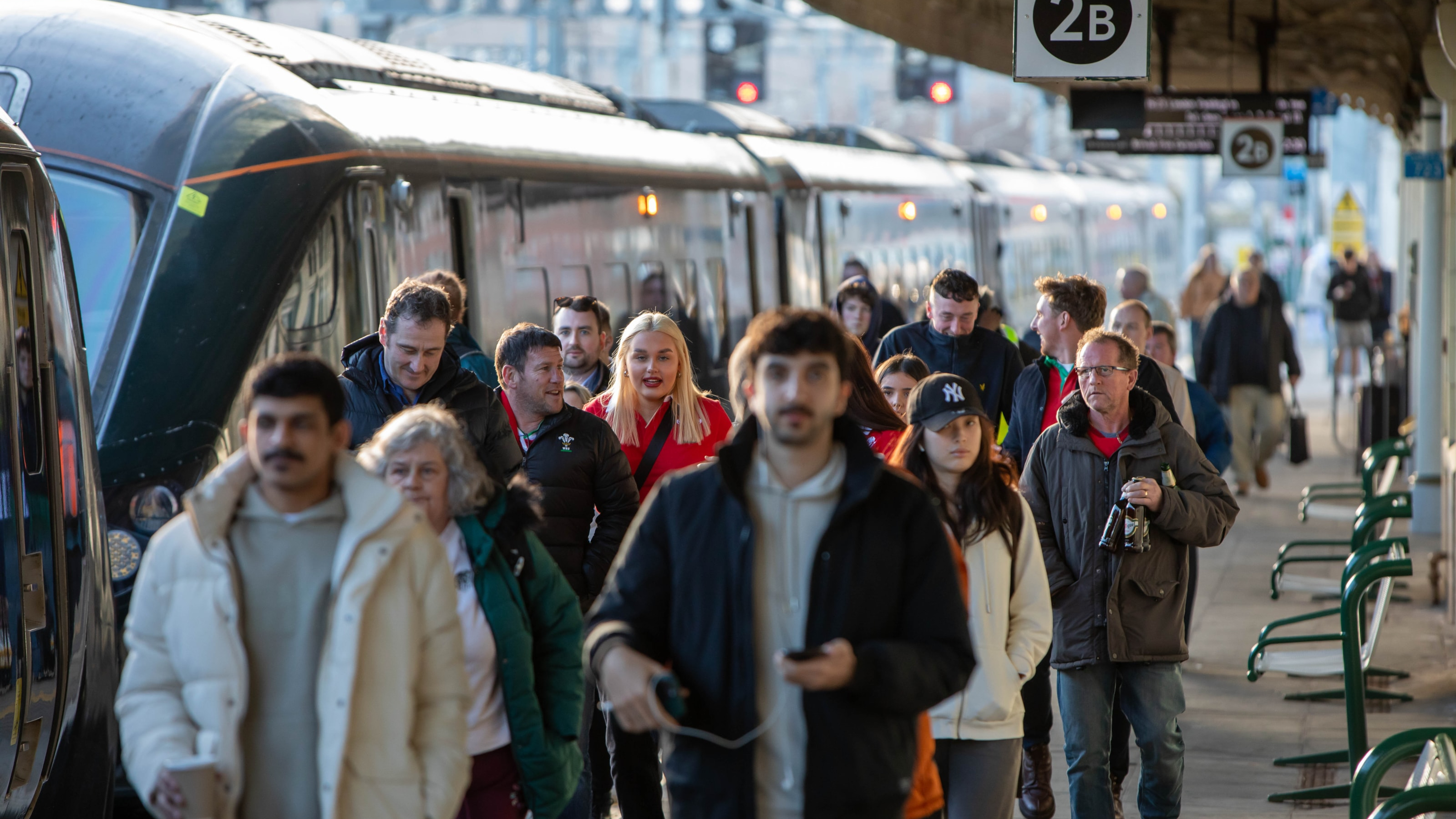 Rugby fans on train station platform